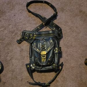 Black Leather Bag with Gold Accents
